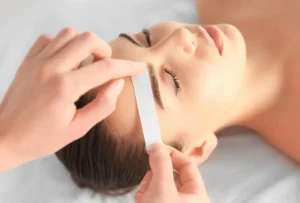 The Eyebrows Waxing Process